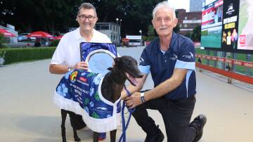 Sandro Bechini (left) with Valpolicella and trainer Tony Zammit after a feature race win at Wentworth Park. Photo Lachlan Naidu