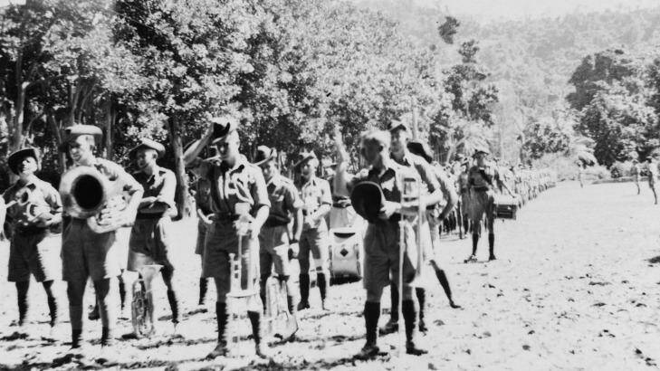 The band of 2/22 Battalion, with the battalion behind it. Some were among the 160 soldiers executed at Tol in 1942. Photo: AWM P02328.004