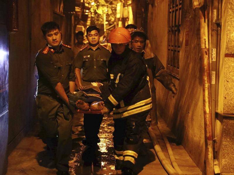 Dozens of people have died after fire broke out in a nine-storey apartment building in Hanoi city. (AP PHOTO)
