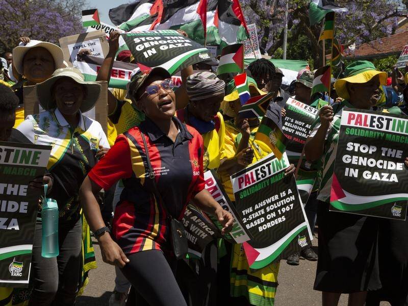 Palestinian supporters have been protesting outside the Israeli embassy in Pretoria, South Africa. (AP PHOTO)